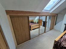 Bedrooms Plus sliding wardrobe doors installed by L.E Joinery
