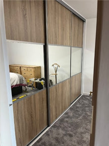 Bedrooms Plus sliding wardrobe doors installed by IM Joinery Ltd