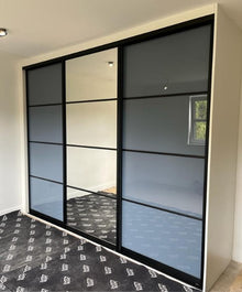 Bedrooms Plus sliding wardrobe doors installed by C.O Interiors
