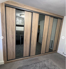 Bedrooms Plus sliding wardrobe doors installed by Cottams Carpentry