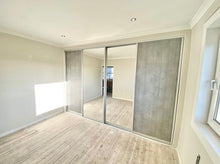 Bedrooms Plus sliding wardrobe doors installed by Stewart Installations