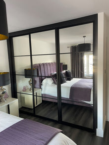 Bedrooms Plus sliding wardrobe doors installed by DNA Prestige