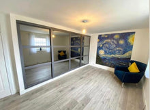 Bedrooms Plus sliding wardrobe doors installed by McIntyre Joinery