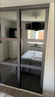 Bedrooms Plus sliding wardrobe doors installed by IM Joinery Ltd