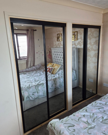 Bedrooms Plus sliding wardrobe doors installed by L.E Joinery