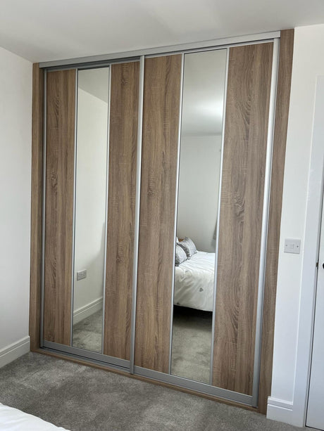 Curve Bardolino Oak & Mirror Sliding Door Wardrobe Kit 4 Panel with Satin Silver Frame - Bedrooms Plus