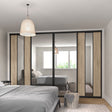 Curve Grey Oak & Mirror Sliding Door Wardrobe Kit 4 Panel Brushed Black Frame - Bedrooms Plus