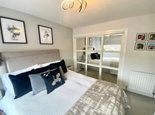 Bedrooms Plus sliding wardrobe doors installed by Stewart Installations